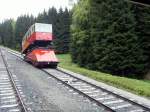 bergbahn/70145/begegnung-mit-der-gueterbuehne-mit-dem Begegnung mit der Gterbhne mit dem geschlossen Personenwagen, 2010