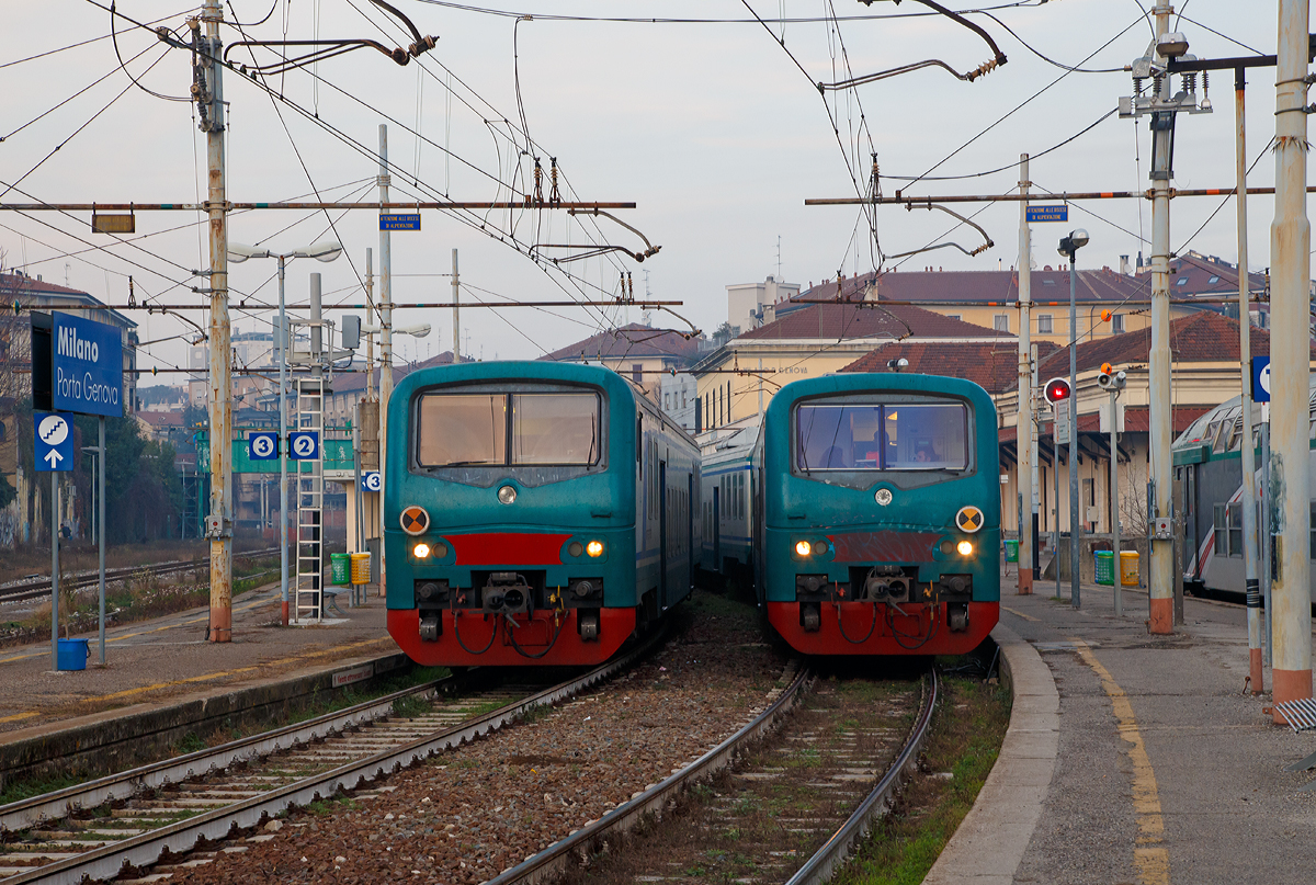 Z
wei Regionalzüge der TRENORD stehen Steuerwagen voraus am 29.12.2015 im Bahnhof Milano Porta Genova (Stazione di Milano Porta Genova) zur Abfahrt bereit.
