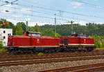   Wiedervereinigung von West und Ost - Zwei V 100 (1x ex DB und 1x ex DR), beide gehören der EfW-Verkehrsgesellschaft mbH, abgestellt am 08.06.2012 in Betzdorf (Sieg):   Links die 212 370-1 (92
