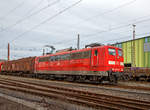   Die 151 031-2 (91 80 6151 031-2 D-DB) der DB Cargo Deutschland AG fährt am 04.03.2017 mit eine Coil-Güterzug (Wagen der Gattung Sahimms und Shimms) durch Siegen-Geisweid in Richtung