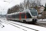   Der ET 23 2102  Märkischer Kreis  (ex ET 23 002) ein 3-teiliger Stadler FLIRT der Abellio Rail NRW GmbH, fährt am 29.12.2014 als RE 16  Ruhr-Sieg-Express  (Essen - Hagen - Siegen) von