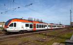   Der vierteilige Stadler FLRIT 401 der VIAS (für die RheingauLinie - SE10) ist am 12.04.2015 im Bahnhof Neuwied abgestellt.