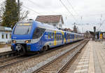 Der sechsteilige Stadler FLIRT 3 - der Meridian ET 301 f�hrt am 28.12.2016 als M 79011 (M�nchen Hbf - Rosenheim - Salzburg Hbf) vom Bahnhof Prien am Chiemsee weiter in Richtung Satzburg.