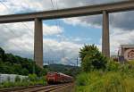 111 010 zieht den RE 9 (Rhein-Sieg-Express) Aachen - K�ln - Siegen, hier am 21.07.2012 hat sie gerade die 105 m hohe Siegtalbr�cke (A45) unterquert und f�hrt weiter in Richtung Siegen.