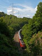 111 118-6 schiebt den RE 9 (Rhein-Sieg-Express) Siegen - K�ln - Aachen am 05.08.2012 in Richtung K�ln.