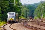   Zwei kurz vor der Einfahrt in ihre Endstation den Bahnhof Au an der Sieg, am 10.06.2014:  Links der Stadler GTW 2/6, VT 101 der Vectus kommt von Altenkirchen  als RB 28  Oberwesterwald-Bahn , er