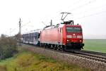 185 16-8 mit Autotransportzug bei Hinterdenkental am 19.10.2012.