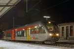 Ein Stadler GTW 2/6 der Hellertalbahn steht am 07.12.2012 abends um 20:38 Uhr in Betzdorf/Sieg zur Abfahrt nach Neunkirchen bereit.