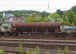 Offener  Sch�ttgutwagen mit dosierbarer Schwerkraftentladung und vier Rads�tzen (31 RIV 80 D-DB 6940 196-2) der Gattung Facs 124 der DB Schenker Rail Deutschland AG, ist am 28.08.2014 in Kreuztal