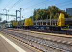 Der elektrische Schmalspur Güterzug-/Personentriebwagen MBC/BAM Be 4/4 12 rangiert, am 07 September 2023 an einer Rollbockgrube beim Bahnhof Morges, den leeren 2 x vierachsiger Flachwagen in