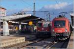 Die ÖBB 1116 279 übernimmt in Singen den IC 280, während im Hintergrund die SBB Re 4/4 II 11134 mit ihrem IC4 auf die Abfahrt nach Zürich wartet.