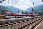 Die beiden dreiteiligen RegionAlps (RA) NINA – RABe 525 041-0 (94 85 7525 041-0 CH-RA) und der RABe 525 038-8 (94 85 7525 038-8 CH-RA), ex BLS NINA 038, stehen am 26.05.2023 im Bahnhof Martigny