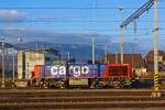   Die SBB Cargo Am 843 065-4 (MaK 1700), abgestellt am 25.02.2012 beim Bahnhof Yverdon-les-Bains, aufgenommen aus einem fahrenden ICN.