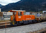 Die RhB Tm 2/2 119 (eine Schöma CFL 250 DA) steht am 01.11.2019 im Bahnhof Thusis (aufgenommen aus einem Zug heraus).