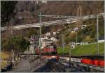 Bei Kilometer 28.4 fährt die Re 6/6 11645 mit einem Güterzug Richtung Wallis.