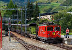Die letzte Tunnellokomotive MGB Ge 4/4 III - 81 „Wallis“ der Matterhorn-Gotthard-Bahn ex FO MGB Ge 4/4 III - 81, steht am 07 September 2021 mit einem Furka-Autoverladezug beim Bahnhof