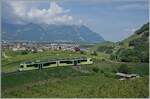Der TPC ASD ABe 4/8 471 ist in den Rebbergen oberhalb von Aigle auf der Fahrt in Richtung Les Diablerets und zeigt sich im Gegensatz zum vorangegangen Bild etwas grösser und mit weniger Umgebung.