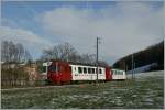 TPF (ex GFM) Regionalzug bestehend aus dem Be 4/4 152 und Bt bei Remaufens.