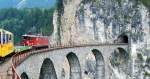 Ge 6/6 II Nr.704 mit dem Railrider-Zug, den offenen Sommer-Aussichtswagen, auf dem Landwasserviadukt am 03.