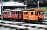 RhB BDe 4/4 Nr.38 und Xm 2/2 Nr.9916 in Poschiavo im August 1990.