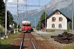 RhB Ge 44 I U Nr.605 mit Steuerwagen Nr.1722 voraus in madulain am 16.08.2009.