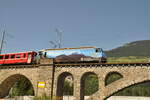 RhB Ge 4/4 III Nr.647 mit Werbung  Graubündener Kantonalbank  auf der Solisbrücke am 15.08.2009.
