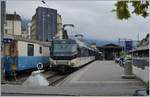 Einen Sekundenbruchteil vor dem Ausl�sen wechselte die MOB Ge 4/4 8004 das Spitzenlich in das f�r die R�ckfahrt nach Zweisimmen n�tige Schlusslicht.