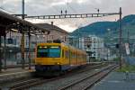   Bahnhof Vevey am 26.05.2012 um 21:11 Uhr, so langsam wird es dunkel, wie auch für den  Train des Vignes  in dieser Zugskomposition und Lackierung düster wird.