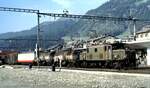 RhB Ge 6/6 I Nr.415 mit gemischtem G�terzug in Samedan im August 1990.